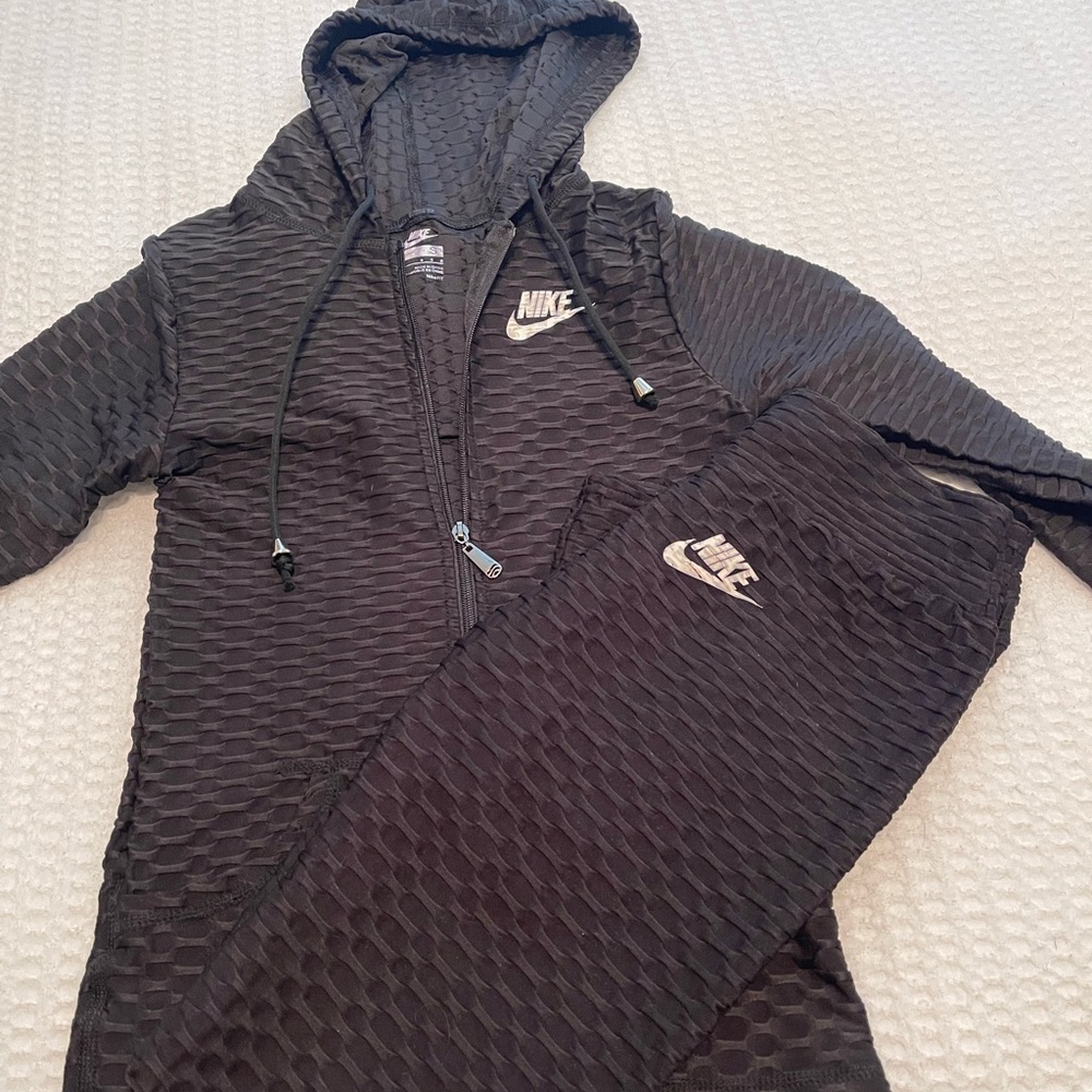 Black Nike bubble jacket with matching pants